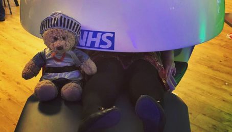 Ted and a colleague try out the relaxing pods in our wellbeing hubs.jpg